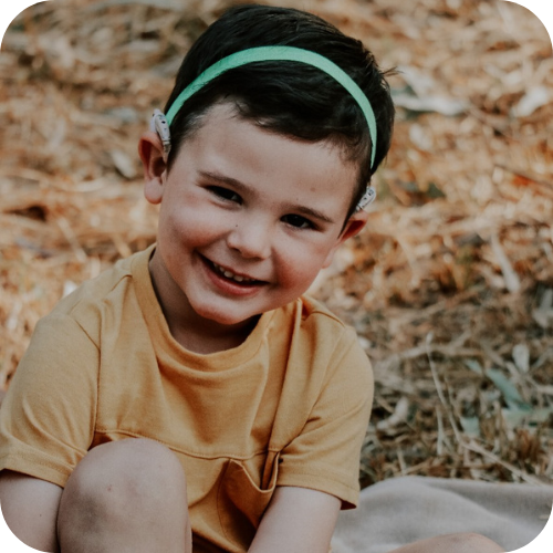 Little Hearo child smiling